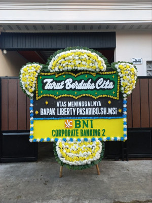 Papan Bunga Duka di Piani