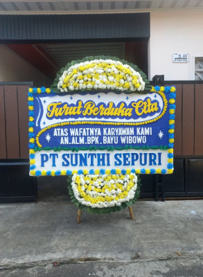 Papan Bunga Duka di Piani