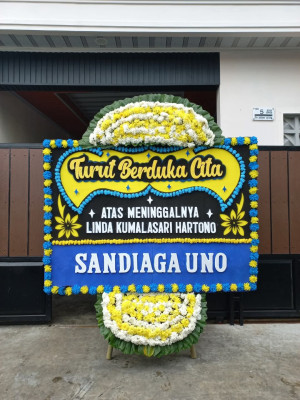 Papan Bunga Duka di Piani