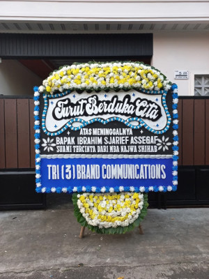 Papan Bunga Duka di Piani